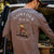 vanlife man making coffee in long sleeve trout top